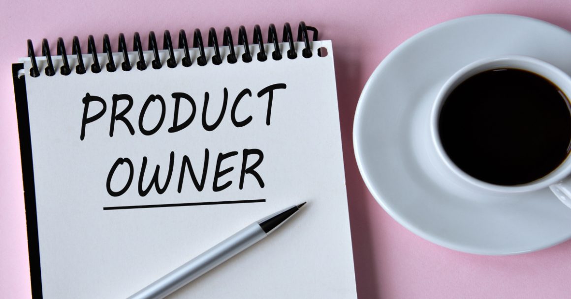 Product owner jobs concept with “Product Owner” handwritten on a notepad beside a cup of coffee.